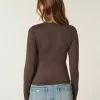 Top de manga larga con cuello redondo y tejido sin costuras Top de manga larga con cuello redondo y tejido sin costuras