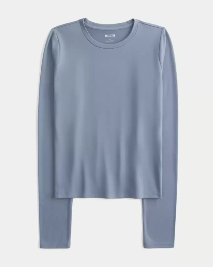Top de manga larga con cuello redondo y tejido sin costuras Top de manga larga con cuello redondo y tejido sin costuras