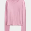 Top de manga larga con cuello redondo y tejido sin costuras Top de manga larga con cuello redondo y tejido sin costuras