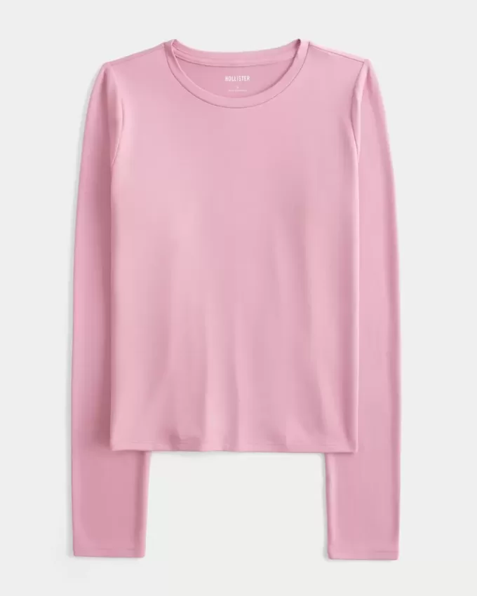 Top de manga larga con cuello redondo y tejido sin costuras Top de manga larga con cuello redondo y tejido sin costuras