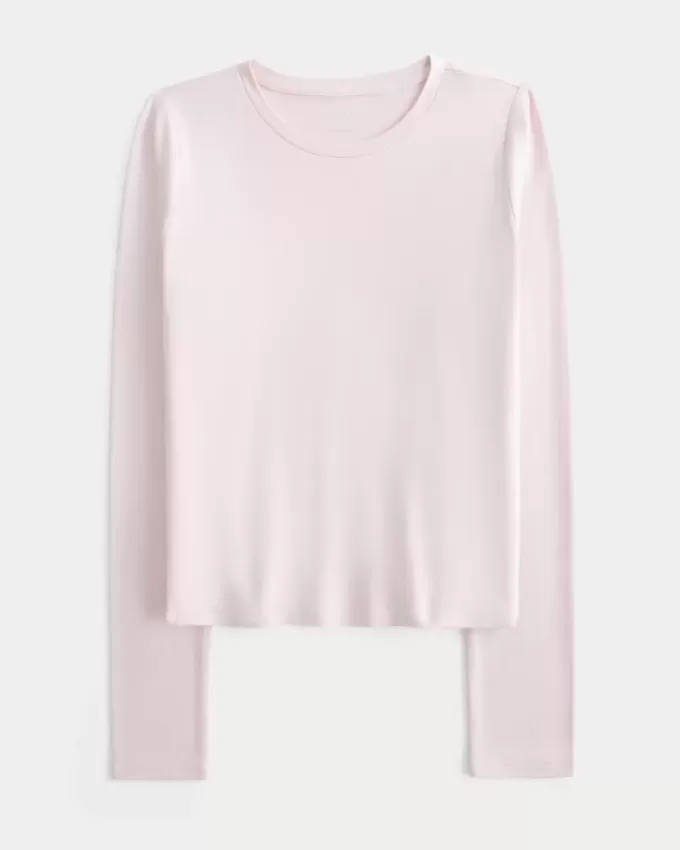 Top de manga larga con cuello redondo y tejido sin costuras Top de manga larga con cuello redondo y tejido sin costuras