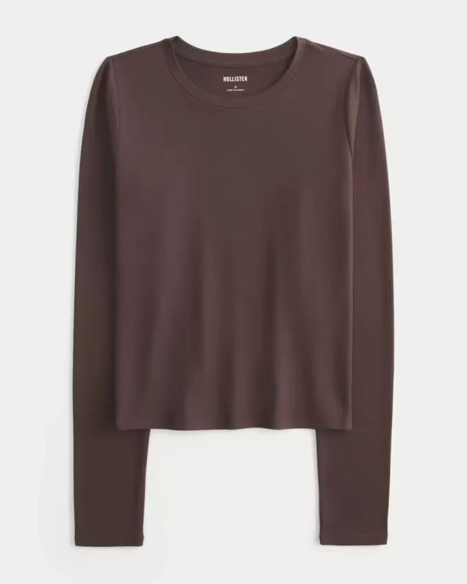 Top de manga larga con cuello redondo y tejido sin costuras Top de manga larga con cuello redondo y tejido sin costuras