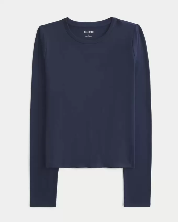 Top de manga larga con cuello redondo y tejido sin costuras Top de manga larga con cuello redondo y tejido sin costuras