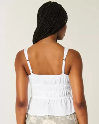 Top peplum con lazo delantero en mezcla de lino