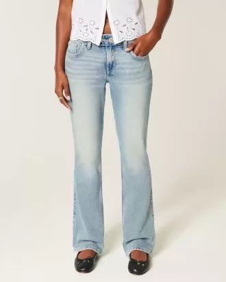 Vaqueros bootcut de tiro bajo con lavado medio y bordado de mariposa