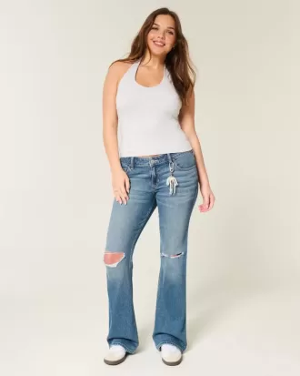 Vaqueros bootcut de tiro bajo, rotos y lavado medio