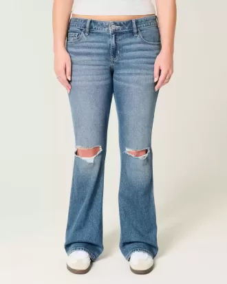 Vaqueros bootcut de tiro bajo, rotos y lavado medio