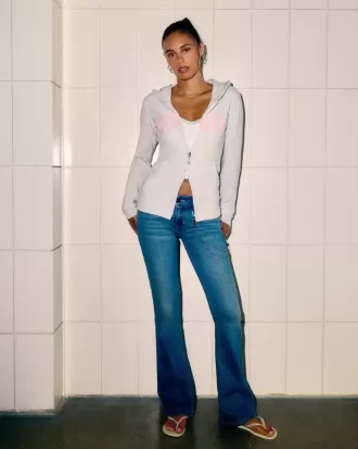 Vaqueros bootcut de tiro bajo y lavado medio
