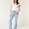Vaqueros bootcut de tiro medio y lavado claro Vaqueros bootcut de tiro medio y lavado claro