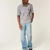 Vaqueros bootcut holgados con lavado medio Vaqueros bootcut holgados con lavado medio
