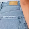 Vaqueros de papá con lavado medio y tiro ultraalto y curvas Vaqueros de papá con lavado medio y tiro ultraalto y curvas
