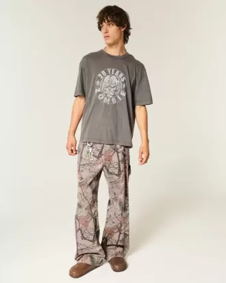 Vaqueros de pintor super holgados con estampado de camuflaje
