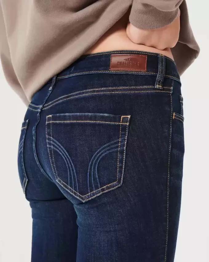 Vaqueros de tiro bajo con lavado oscuro Vaqueros de tiro bajo con lavado oscuro