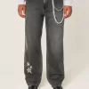 Vaqueros holgados con estampado de estrellas negras lavadas Vaqueros holgados con estampado de estrellas negras lavadas