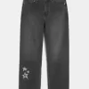 Vaqueros holgados con estampado de estrellas negras lavadas Vaqueros holgados con estampado de estrellas negras lavadas