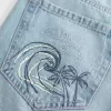 Vaqueros holgados con lavado claro, rotos y cintura baja Vaqueros holgados con lavado claro, rotos y cintura baja