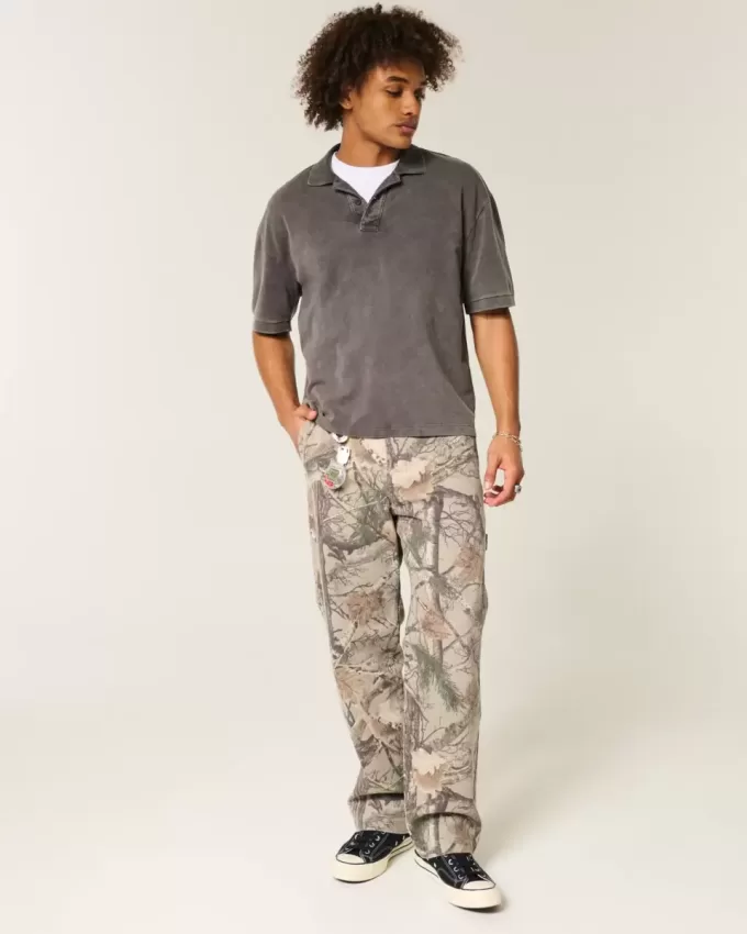 Vaqueros holgados de pintor con estampado de camuflaje