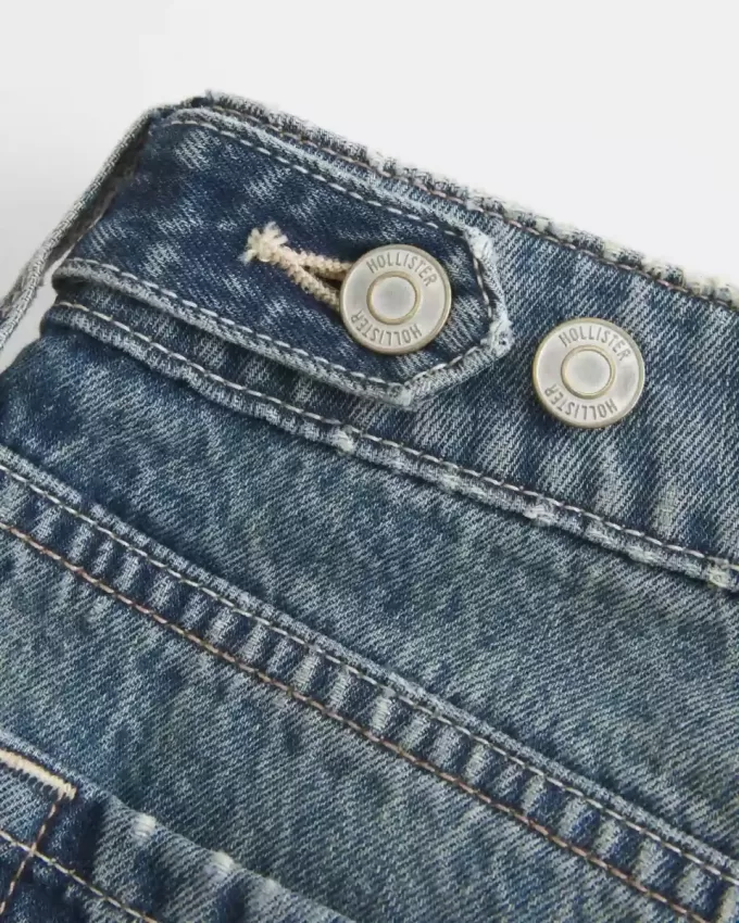 Vaqueros holgados de talle bajo con cintura ajustable y lavado medio Vaqueros holgados de talle bajo con cintura ajustable y lavado medio
