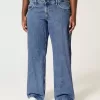 Vaqueros holgados de talle bajo con lavado medio y curvas Vaqueros holgados de talle bajo con lavado medio y curvas