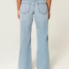 Vaqueros holgados de talle bajo con lavado medio y curvas Vaqueros holgados de talle bajo con lavado medio y curvas