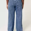 Vaqueros holgados de talle bajo con lavado medio y curvas Vaqueros holgados de talle bajo con lavado medio y curvas
