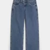 Vaqueros holgados de talle bajo con lavado medio y curvas Vaqueros holgados de talle bajo con lavado medio y curvas