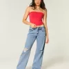 Vaqueros holgados de talle bajo con lavado medio y rotos con curvas Vaqueros holgados de talle bajo con lavado medio y rotos con curvas