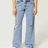 Vaqueros holgados de talle bajo con lavado medio y rotos con curvas Vaqueros holgados de talle bajo con lavado medio y rotos con curvas