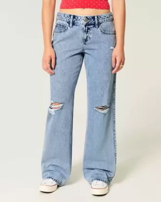 Vaqueros holgados de talle bajo con lavado medio y rotos con curvas Vaqueros holgados de talle bajo con lavado medio y rotos con curvas