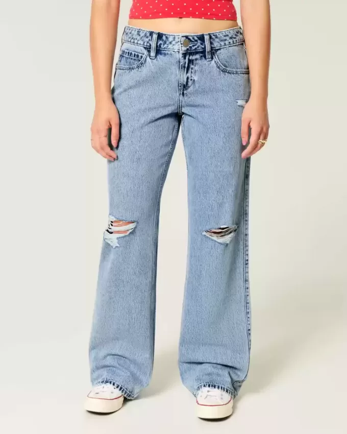 Vaqueros holgados de talle bajo con lavado medio y rotos con curvas Vaqueros holgados de talle bajo con lavado medio y rotos con curvas