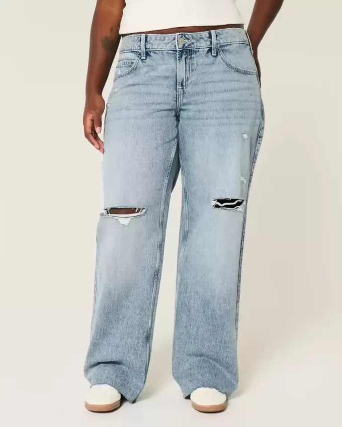 Vaqueros holgados de talle bajo con lavado medio y rotos con curvas Vaqueros holgados de talle bajo con lavado medio y rotos con curvas