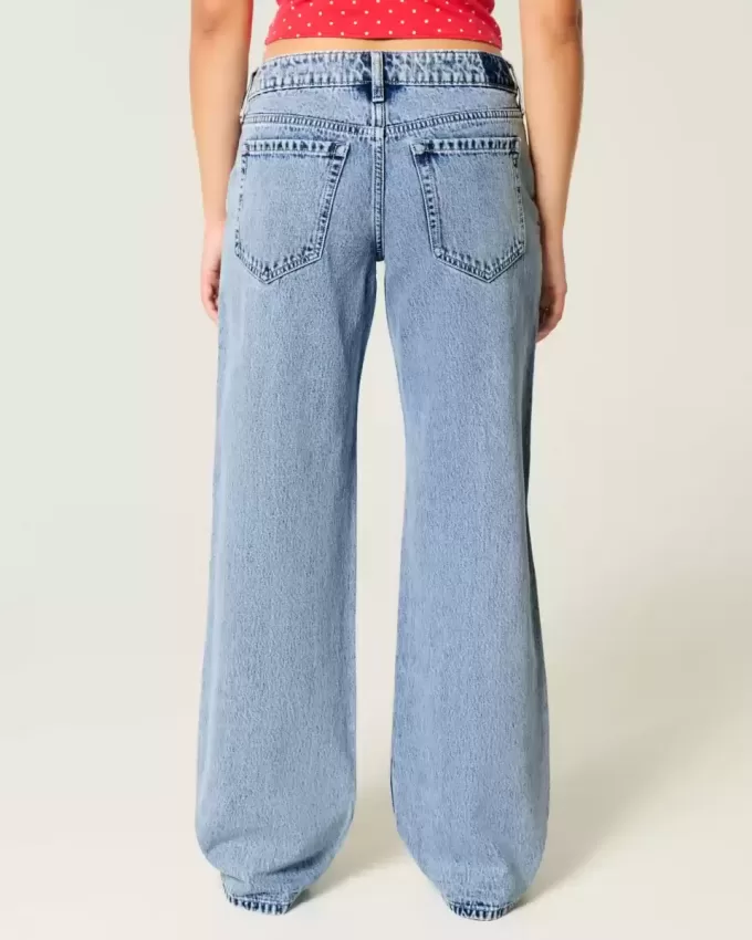 Vaqueros holgados de talle bajo con lavado medio y rotos con curvas Vaqueros holgados de talle bajo con lavado medio y rotos con curvas