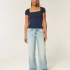 Vaqueros holgados de tiro bajo con lavado claro y curvas Vaqueros holgados de tiro bajo con lavado claro y curvas