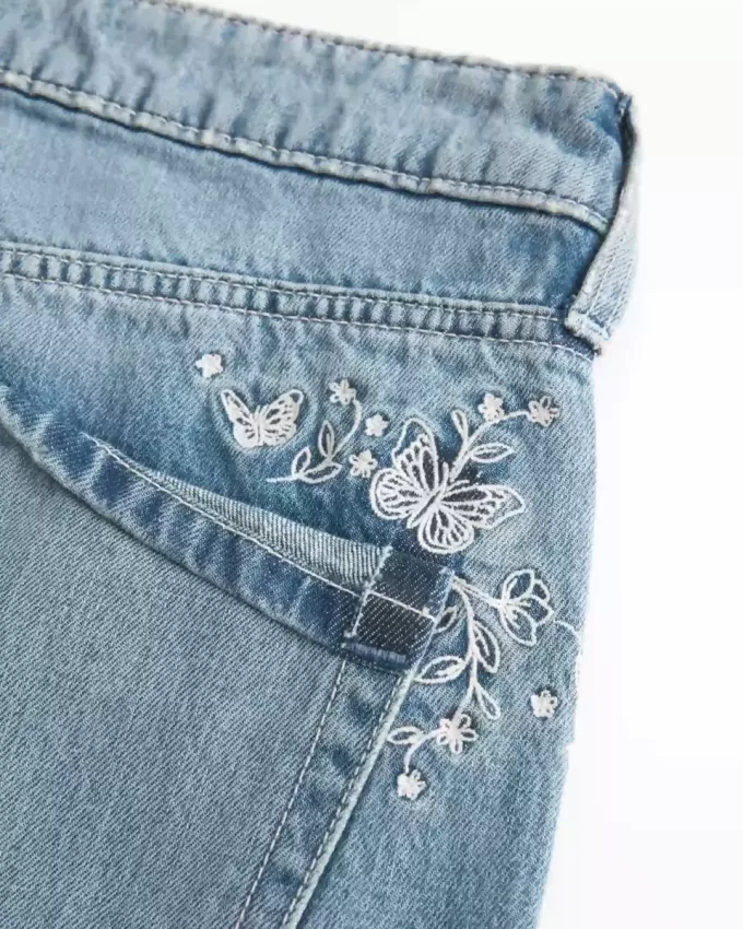 Vaqueros holgados de tiro bajo con lavado medio y estampado de mariposas Vaqueros holgados de tiro bajo con lavado medio y estampado de mariposas