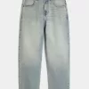 Vaqueros holgados estilo skater con lavado claro y bordados en dados Vaqueros holgados estilo skater con lavado claro y bordados en dados