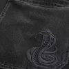 Vaqueros holgados estilo skater con serpiente bordada en negro lavado Vaqueros holgados estilo skater con serpiente bordada en negro lavado