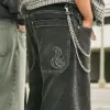 Vaqueros holgados estilo skater con serpiente bordada en negro lavado Vaqueros holgados estilo skater con serpiente bordada en negro lavado