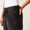Vaqueros holgados negros lavados con cintura ajustable y tiro bajo Vaqueros holgados negros lavados con cintura ajustable y tiro bajo