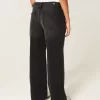 Vaqueros holgados negros lavados con cintura ajustable y tiro bajo Vaqueros holgados negros lavados con cintura ajustable y tiro bajo