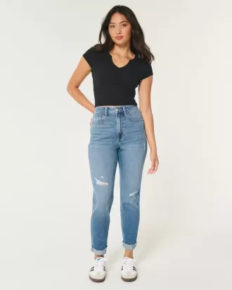 Vaqueros mom de tiro ultraalto con lavado medio rotos y curvas