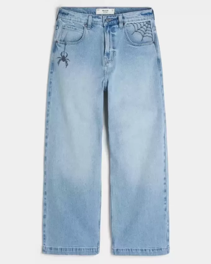 Vaqueros super holgados con estampado de araña y lavado claro Vaqueros super holgados con estampado de araña y lavado claro