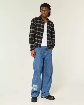 Vaqueros super holgados con lavado medio y estampado NYC
