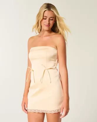 Vestido ajustado de satén sin tirantes con lazo