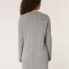 Vestido estilo suéter extragrande de punto trenzado