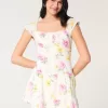 Vestido falda pantalón con mangas onduladas