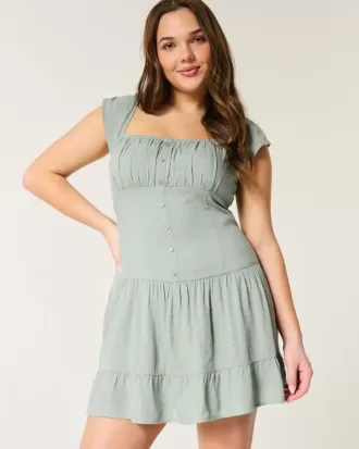 Vestido falda pantalón con mangas onduladas