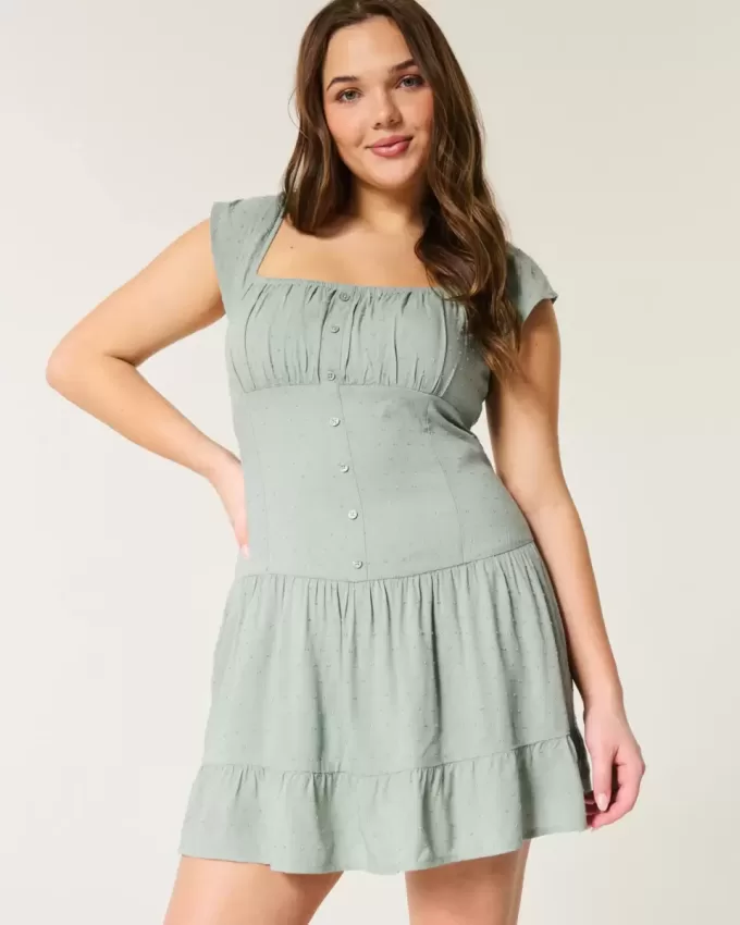 Vestido falda pantalón con mangas onduladas Vestido falda pantalón con mangas onduladas