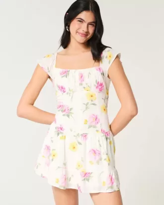 Vestido falda pantalón con mangas onduladas