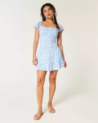 Vestido falda pantalón con mangas onduladas