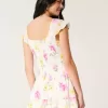 Vestido falda pantalón con mangas onduladas